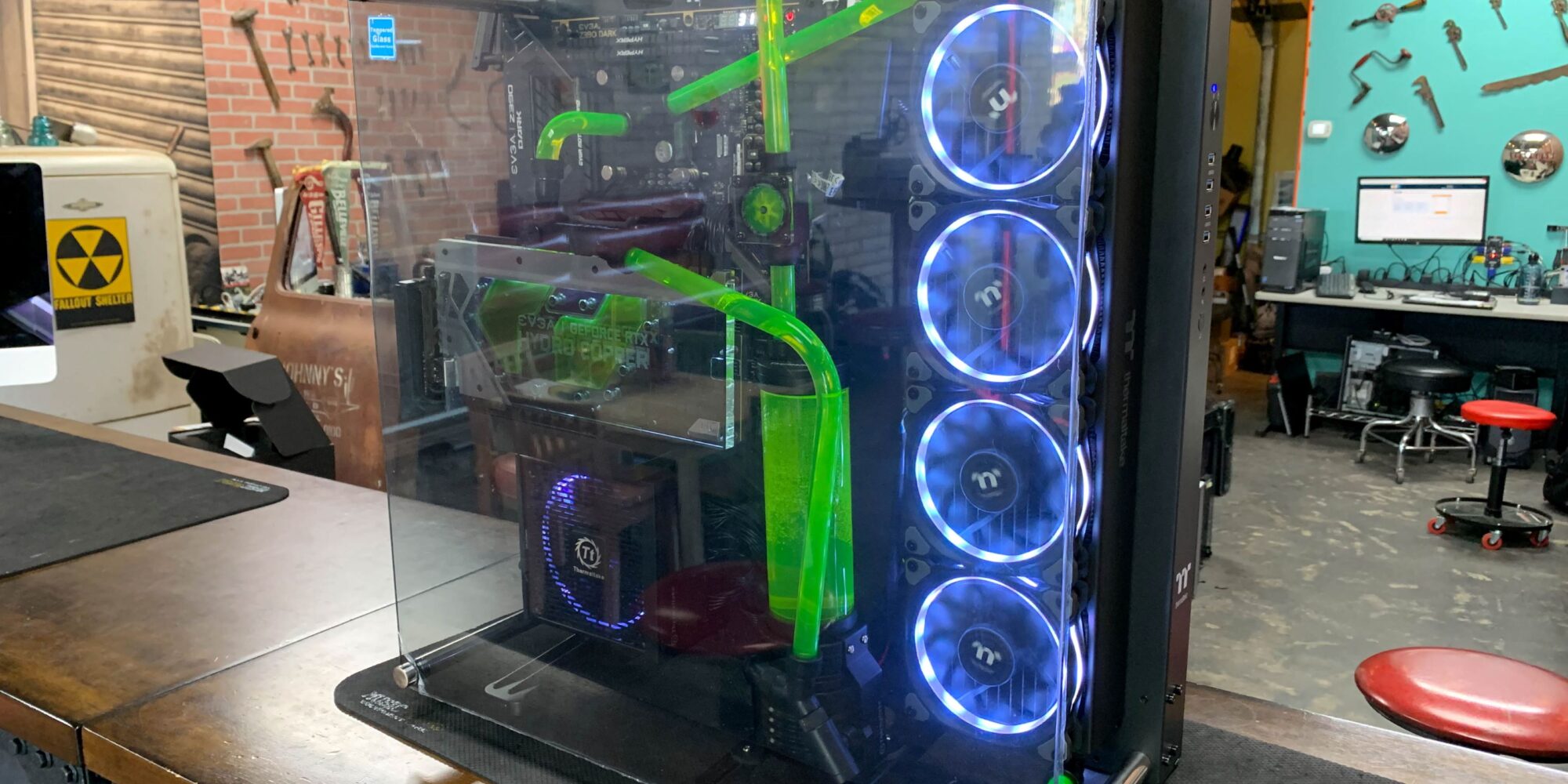 Green liquid Cooling, Blue Fans, & Clear Glass Display
